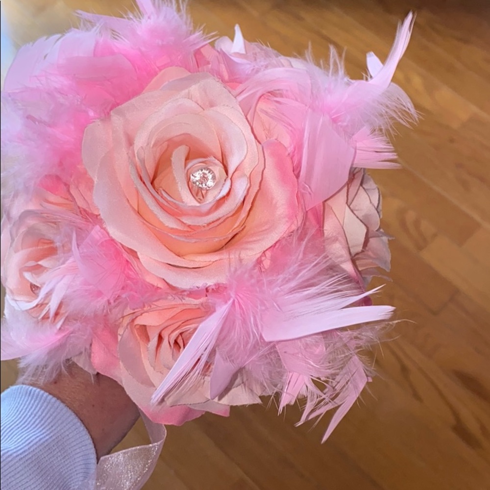Pink toss bouquet with feathers and rhinestones